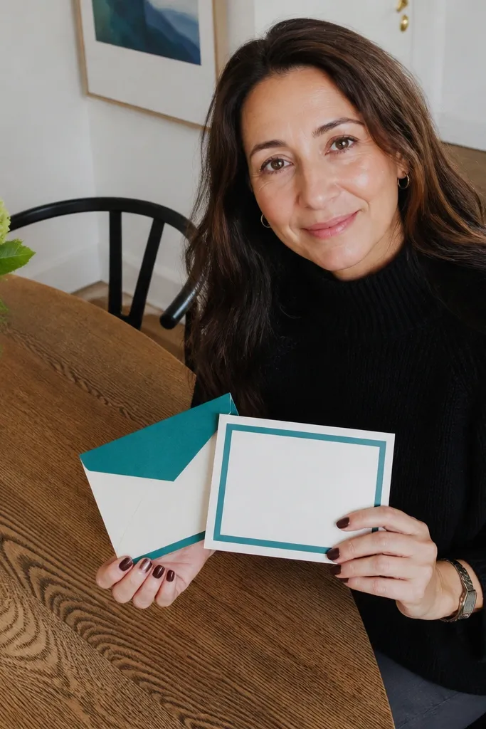 A card with matching color blocks and an envelope with a coordinated stripe design.