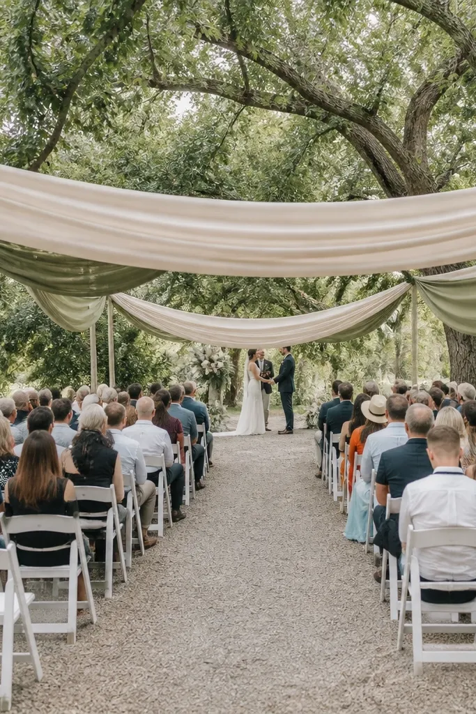 Soft neutral fabric swags hanging above a seating area