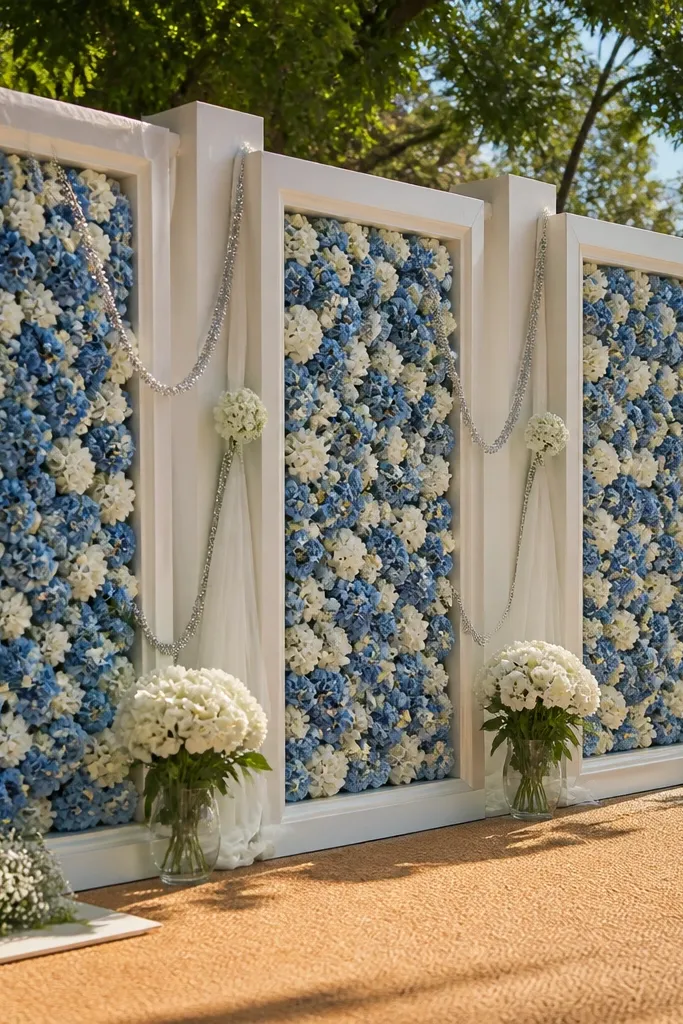 Blue and white hydrangea-style floral panels arranged behind a stage