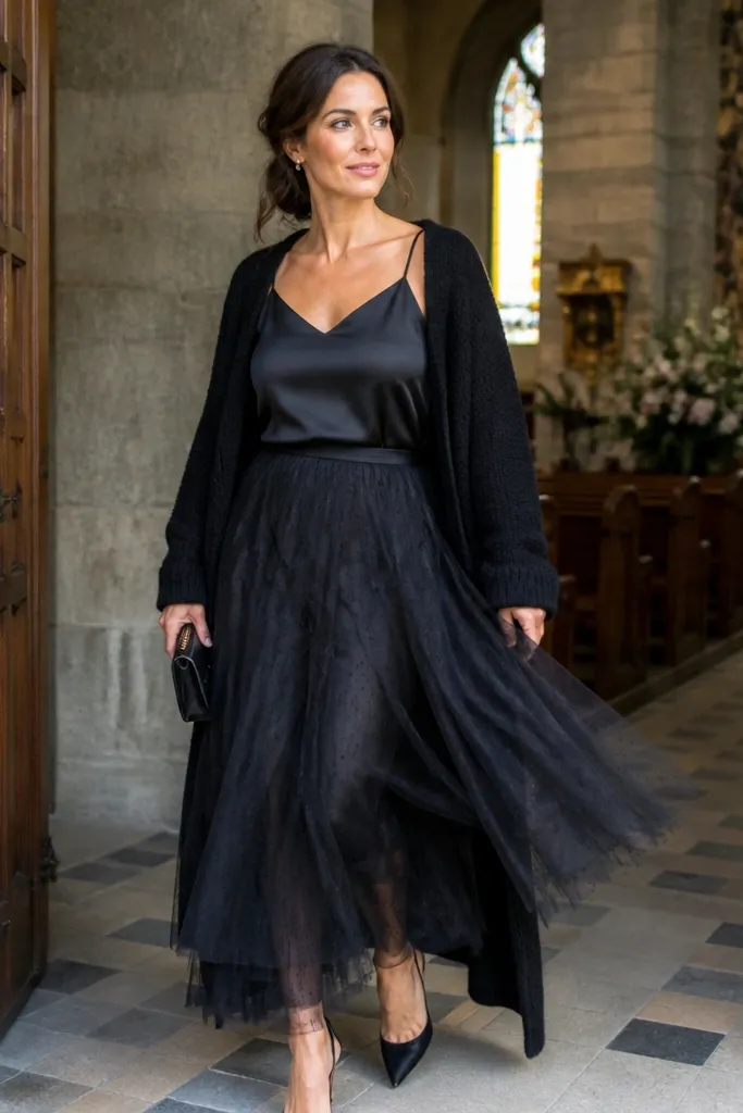 Black tulle skirt with satin camisole and long wool cardigan