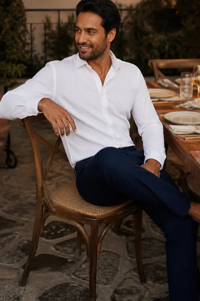 White dobby shirt with navy chinos and brown leather shoes
