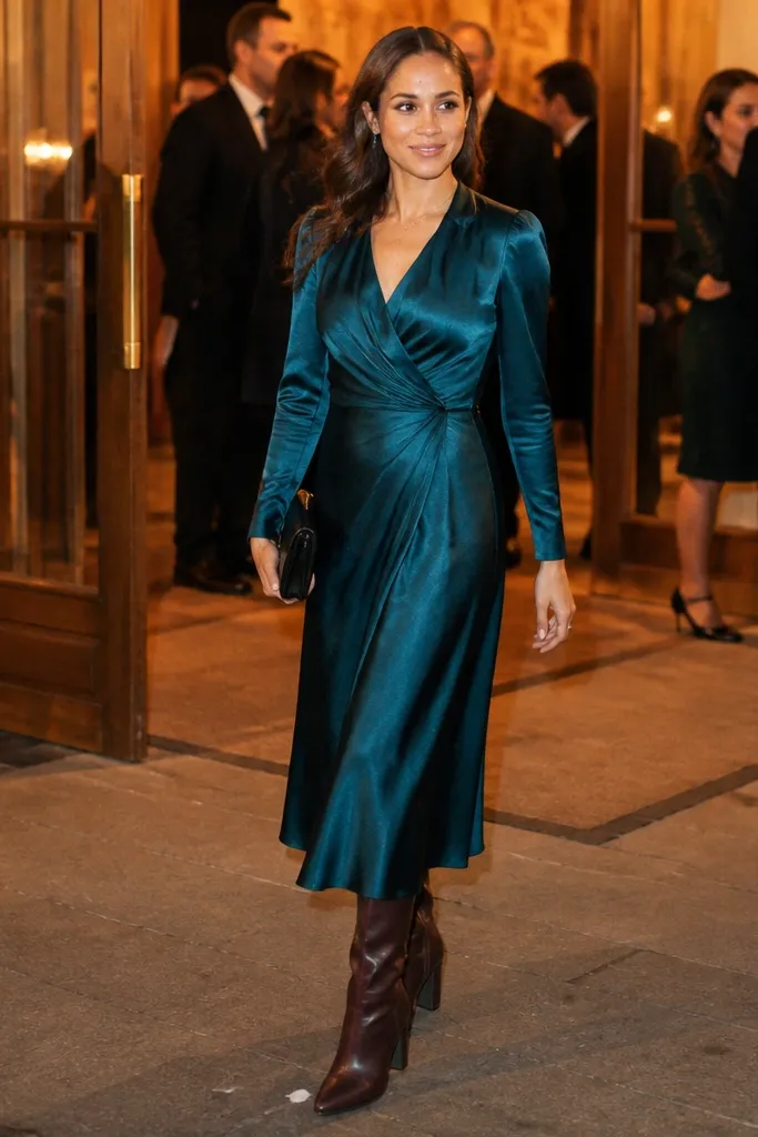 Teal satin midi dress with mid-calf block-heel boots and tights